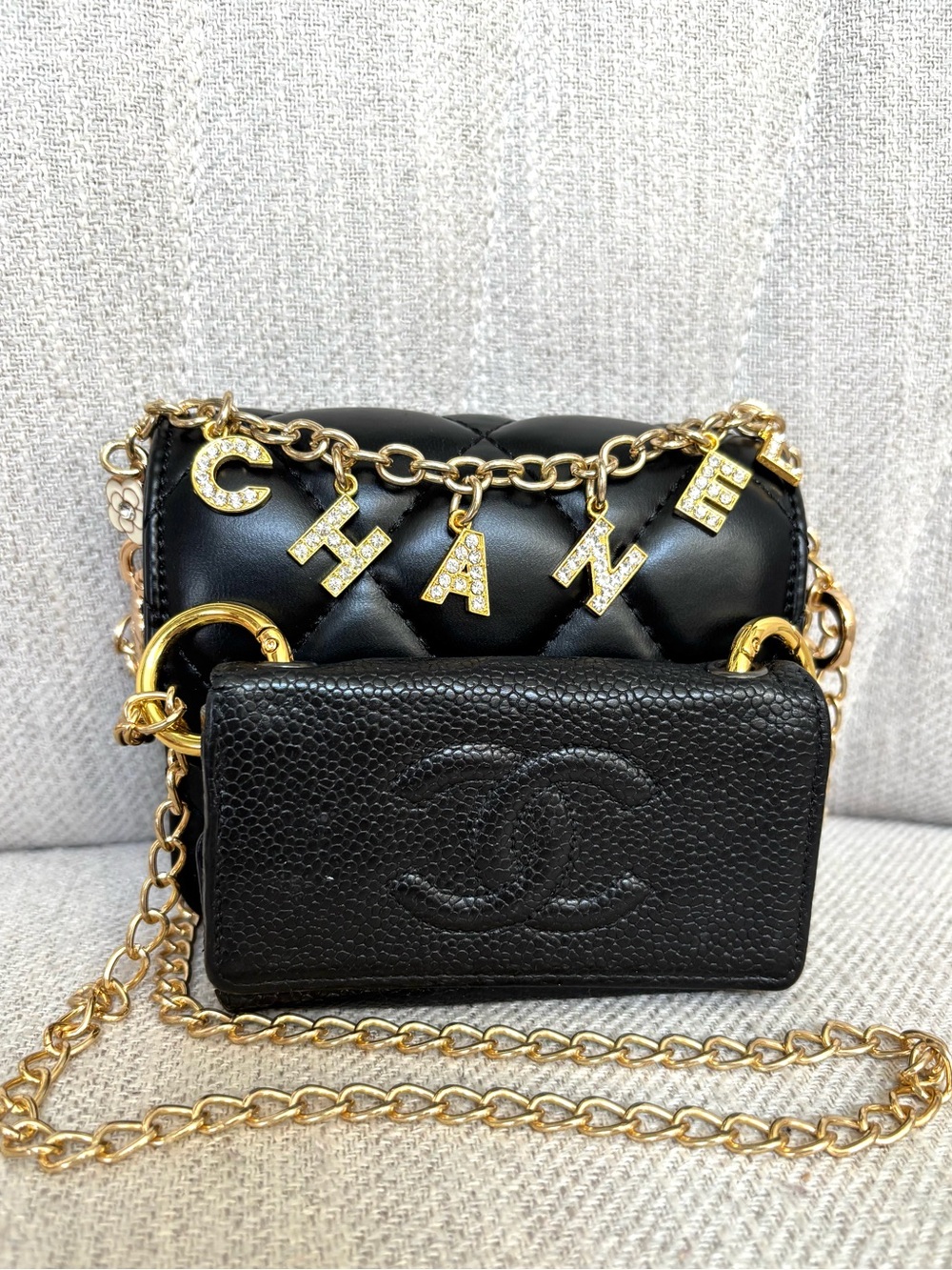 CHA-NEL CC Black Leather Key Wallet paired with new offmarket mini bag,